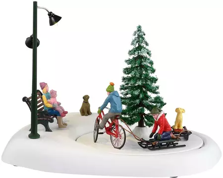 Lemax snowbiking with dad kerstdorp figuur