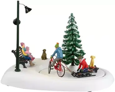 Lemax snowbiking with dad kerstdorp figuur